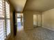 Bright bedroom with mirrored closet doors and carpet at 7869 E Horseshoe Ln, Scottsdale, AZ 85250