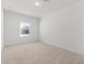 Empty bedroom with neutral carpet and window view at 7862 N 80Th Ave, Glendale, AZ 85303