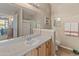 Clean bathroom with a single sink vanity and shower at 14950 W Mountain View Blvd # 1208, Surprise, AZ 85374