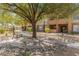 Community courtyard with trees and seating at 14950 W Mountain View Blvd # 1208, Surprise, AZ 85374