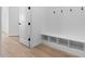 Functional entryway with built-in bench and storage at 37735 W Padilla St, Maricopa, AZ 85138