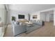 Open living room with ample natural light and comfortable seating at 37735 W Padilla St, Maricopa, AZ 85138