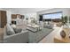 Bright and airy living room with access to backyard patio at 37735 W Padilla St, Maricopa, AZ 85138