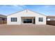 New construction home showcasing a large backyard with a patio at 37735 W Padilla St, Maricopa, AZ 85138