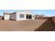 Spacious backyard with a large, open area and block wall at 37735 W Padilla St, Maricopa, AZ 85138