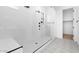Large walk-in shower with built-in seat at 37735 W Padilla St, Maricopa, AZ 85138