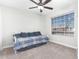 Small bedroom with a daybed and plenty of natural light at 6217 E Grandview St, Mesa, AZ 85205