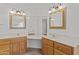 Spacious bathroom with double sinks, marble vanity, and large mirrors at 2325 W Highridge Rd, Wickenburg, AZ 85390