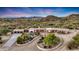 Stunning aerial view of a single-story home with pool and desert landscaping at 27211 N 111 St, Scottsdale, AZ 85262