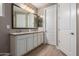 Elegant bathroom with double vanity and granite countertop at 12794 W Burnside Trl, Peoria, AZ 85383