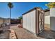 White and brown storage shed in backyard at 5312 E Evans Dr, Scottsdale, AZ 85254