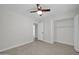 Light bedroom with ceiling fan and large closet at 5312 E Evans Dr, Scottsdale, AZ 85254