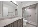 Modern bathroom with vanity, glass shower and toilet at 5312 E Evans Dr, Scottsdale, AZ 85254