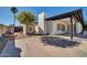 Spacious backyard with covered patio, shed, and fire pit area at 5312 E Evans Dr, Scottsdale, AZ 85254