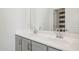 Double vanity bathroom with gray cabinets and gold hardware at 6412 N 17Th Pl, Phoenix, AZ 85016