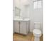 Clean bathroom with single sink vanity and toilet at 6412 N 17Th Pl, Phoenix, AZ 85016