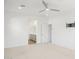 Bright bedroom with ceiling fan and ensuite bathroom access at 6412 N 17Th Pl, Phoenix, AZ 85016