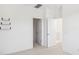 Upstairs hallway with access to bedrooms and stairs at 6412 N 17Th Pl, Phoenix, AZ 85016