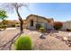 One-story house with desert landscaping and a two-car garage at 10112 S 185Th Dr, Goodyear, AZ 85338