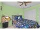 Full-size bed in a bedroom with light green walls at 4833 W Dublin Ct, Chandler, AZ 85226