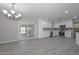 Bright dining area with hardwood floors and chandelier at 3823 W State Ave, Phoenix, AZ 85051