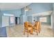 Spacious dining room with high ceilings and wood dining table at 7621 W Comet Ave, Peoria, AZ 85345