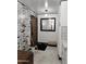 Clean entryway, with a wood accent door and white walls at 3119 W Cochise Dr # 225, Phoenix, AZ 85051