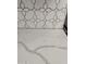 White and gray geometric kitchen backsplash at 3119 W Cochise Dr # 225, Phoenix, AZ 85051