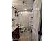 Clean bathroom with shower/tub combo and white tile at 3119 W Cochise Dr # 225, Phoenix, AZ 85051