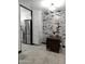 Small dining area with a dark brown table and white metal chairs at 3119 W Cochise Dr # 225, Phoenix, AZ 85051
