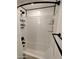 Bathroom with a shower/tub combo and white diamond tile at 3119 W Cochise Dr # 225, Phoenix, AZ 85051