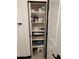 Linen closet with ample storage shelving for towels and bathroom supplies at 3119 W Cochise Dr # 225, Phoenix, AZ 85051