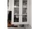 Glass-front cabinets showing organized dishes and glassware at 3119 W Cochise Dr # 225, Phoenix, AZ 85051