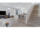Open-concept living area with stairs, kitchen, and dining area visible at 10763 W Beatrice St, Avondale, AZ 85323