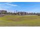 Community playground with shaded seating area at 10763 W Beatrice St, Avondale, AZ 85323