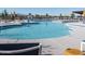 Community pool with multiple areas for swimming at 10763 W Beatrice St, Avondale, AZ 85323