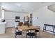 Bright kitchen with white cabinets, stainless steel appliances, and an island at 10763 W Beatrice St, Avondale, AZ 85323