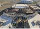 Aerial view of Desert Diamond Arena and adjacent buildings at 7119 W Roma Ave, Phoenix, AZ 85033