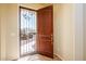 Front entry with decorative security door at 42086 W Solitare Dr, Maricopa, AZ 85138
