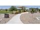Community park with playground, shaded seating, and walking paths at 36503 W San Ildefanso Ave, Maricopa, AZ 85138