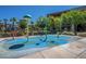 spray park with colorful features at 18226 W Desert Willow Dr, Goodyear, AZ 85338