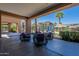 Inviting patio with comfortable seating overlooking the pool at 18226 W Desert Willow Dr, Goodyear, AZ 85338