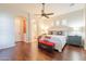Spacious main bedroom with hardwood floors and ensuite bathroom access at 18226 W Desert Willow Dr, Goodyear, AZ 85338