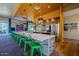 Community kitchen with modern appliances and seating at 18226 W Desert Willow Dr, Goodyear, AZ 85338