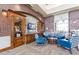 Relaxing clubhouse library with comfortable seating and bookshelves at 18226 W Desert Willow Dr, Goodyear, AZ 85338