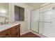 Updated bathroom with walk-in shower and new vanity at 11596 W Sierra Dawn Blvd # 157, Surprise, AZ 85378