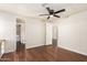 Bedroom with wood-look flooring and access to laundry at 11596 W Sierra Dawn Blvd # 157, Surprise, AZ 85378