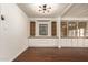 Built-in wooden shelving and cabinets in a living area at 11596 W Sierra Dawn Blvd # 157, Surprise, AZ 85378