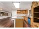 Updated kitchen features granite countertops, modern appliances, and wood-look flooring at 11596 W Sierra Dawn Blvd # 157, Surprise, AZ 85378