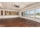 Spacious living area with hardwood floors and built-in shelving at 11596 W Sierra Dawn Blvd # 157, Surprise, AZ 85378